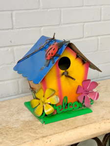 Welcome with ladybug hanging birdhouse