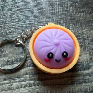 Dumpling Squish Toy Hard Plastic Keychain Purple