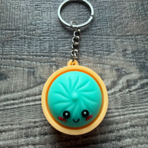 Dumpling Squish Toy Hard Plastic Keychain Teal